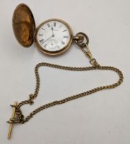 A Waltham gold plated Hunter pocket watch initialled, with a gold plated watch chain Location: Cab