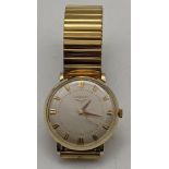 A 1950s 14ct gold Longines manual wind watch with engraving to the case back Location: