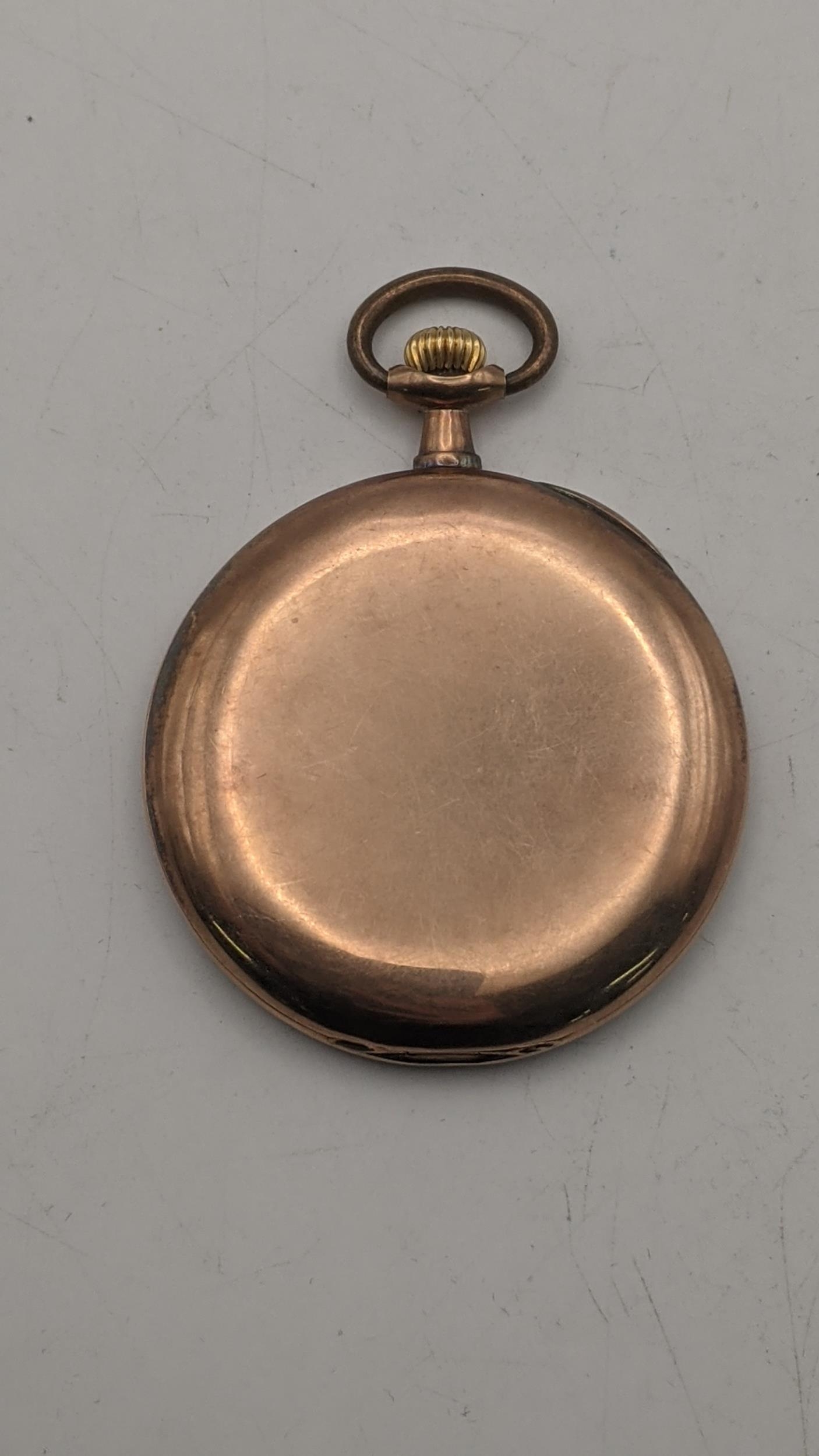 An early 20th century rose gold faced pocket watch tested as 8ct gold, total weight 48.2g Location: - Image 2 of 3