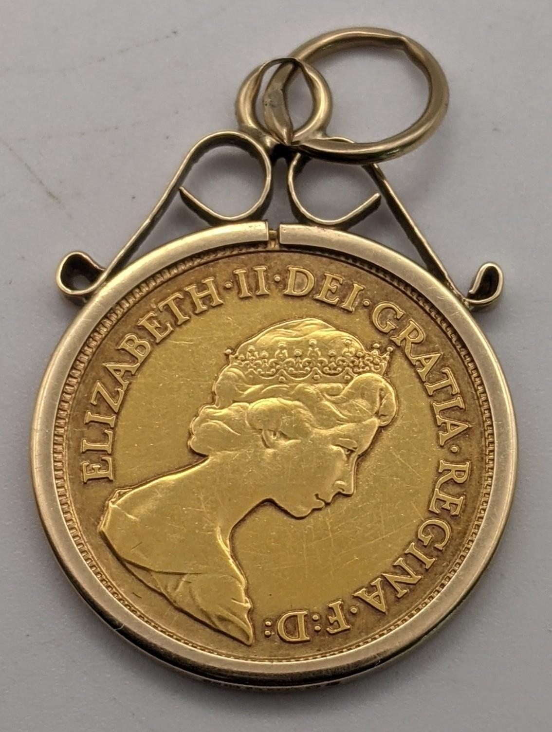 A 1982 half sovereign, mounted in a 9ct gold pendant, total weight 4.8g Location: - Image 2 of 2
