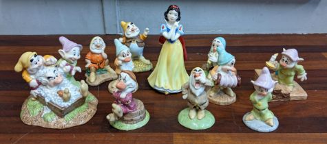 Royal Doulton collectable figures to include Snow White and the Seven Dwarves, Grumpy's Bath time,