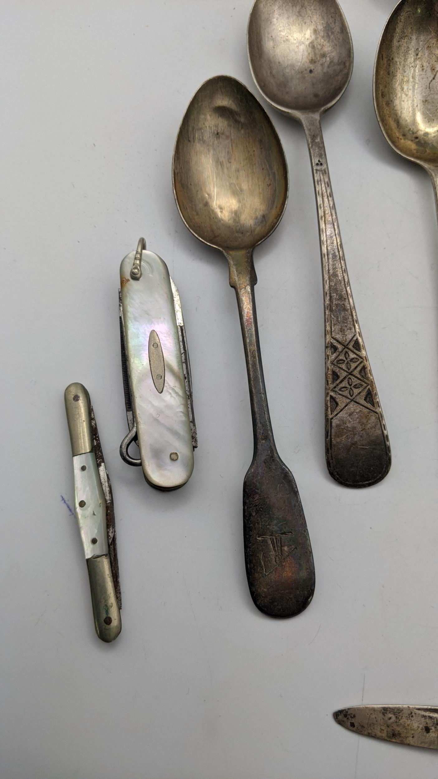 A mixed lot to include five silver spoons and a white metal toddy ladle 145.9g, along with a - Image 3 of 4