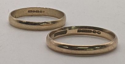 Two 9ct gold wedding bands, one size S 1/2 and the other size R 1/2, 6.1g Location: