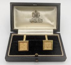 A pair of 9ct gold square shaped cuff links, 8.6g in a fitted case Location: