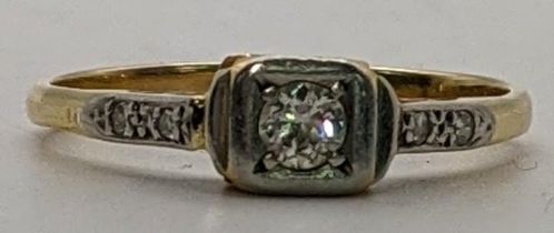 A gold coloured ring set with a diamond tested as 18ct, 2.9g Location: