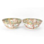 A pair of Chinese export late 19th century Canton Famille Rose porcelain bowls, in polychrome