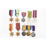 A group of WWI and WWII medals to include a three medal WW1 group including a Royal fleet reserve