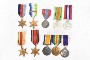 A group of WWI and WWII medals to include a three medal WW1 group including a Royal fleet reserve