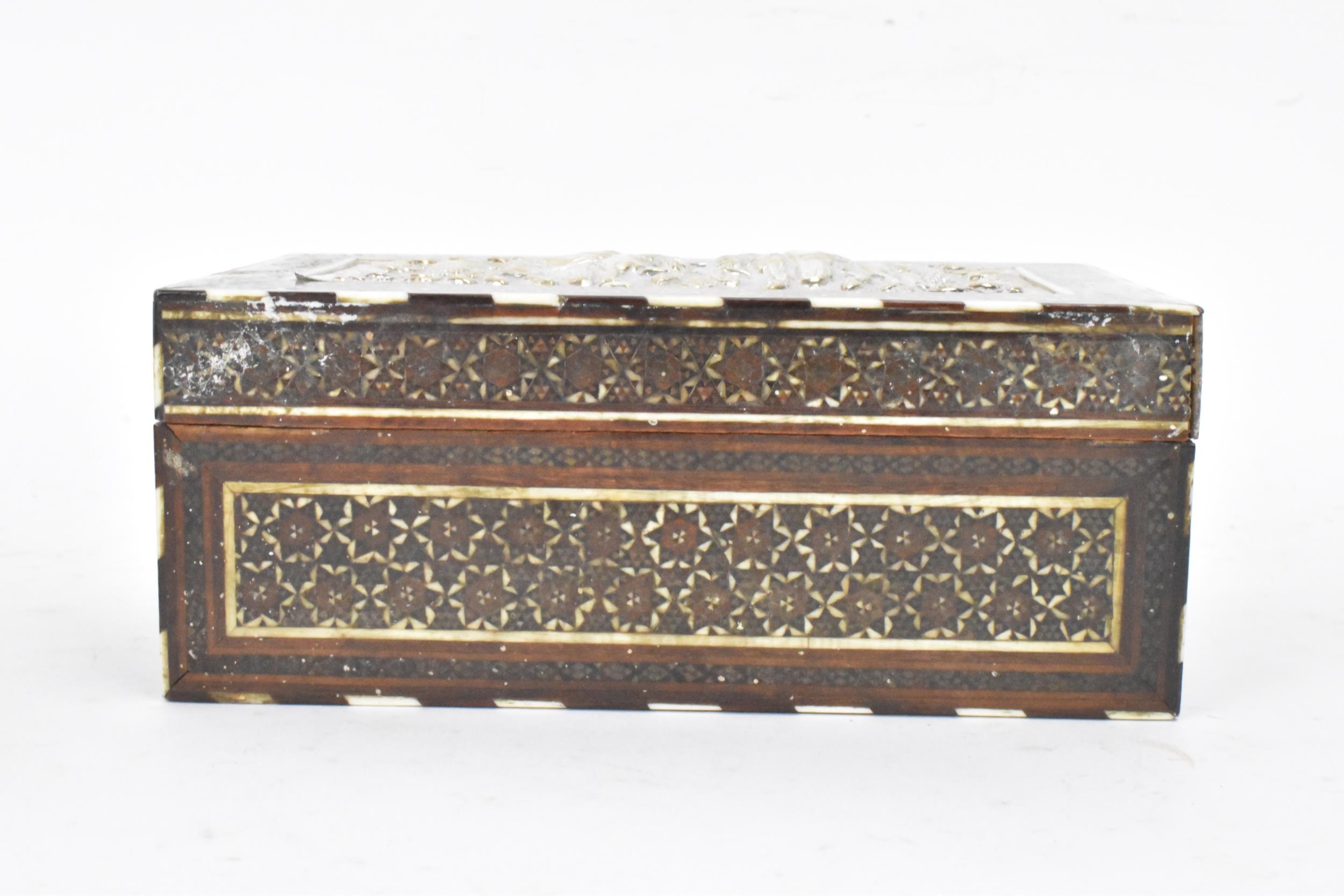 A late 19th century Indo-Persian katamkari cigarette box, decorated with a silver repousse panel - Image 3 of 8