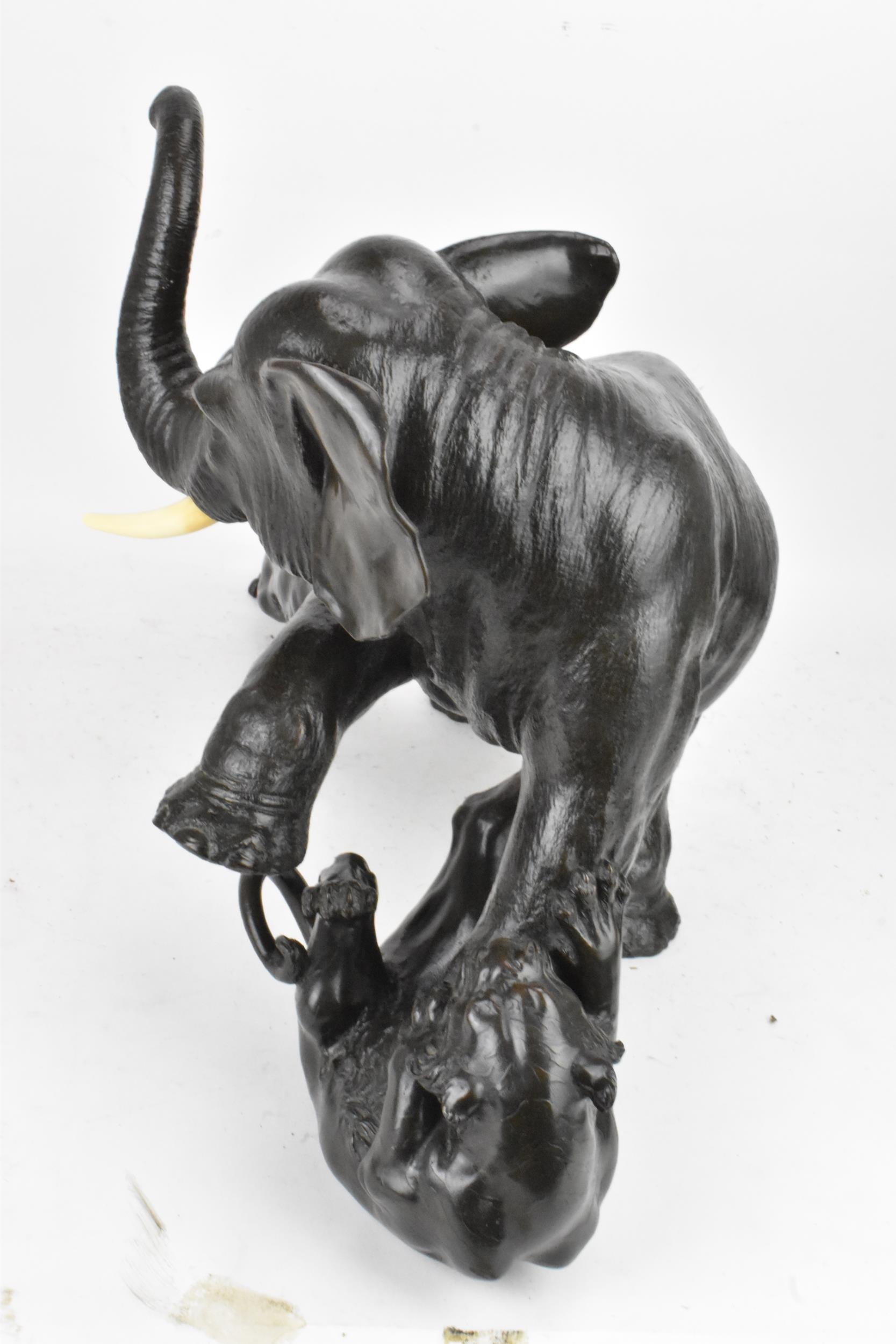 A Japanese Meiji period bronze group modeled as an elephant being attacked by three Siberian tigers, - Image 5 of 15