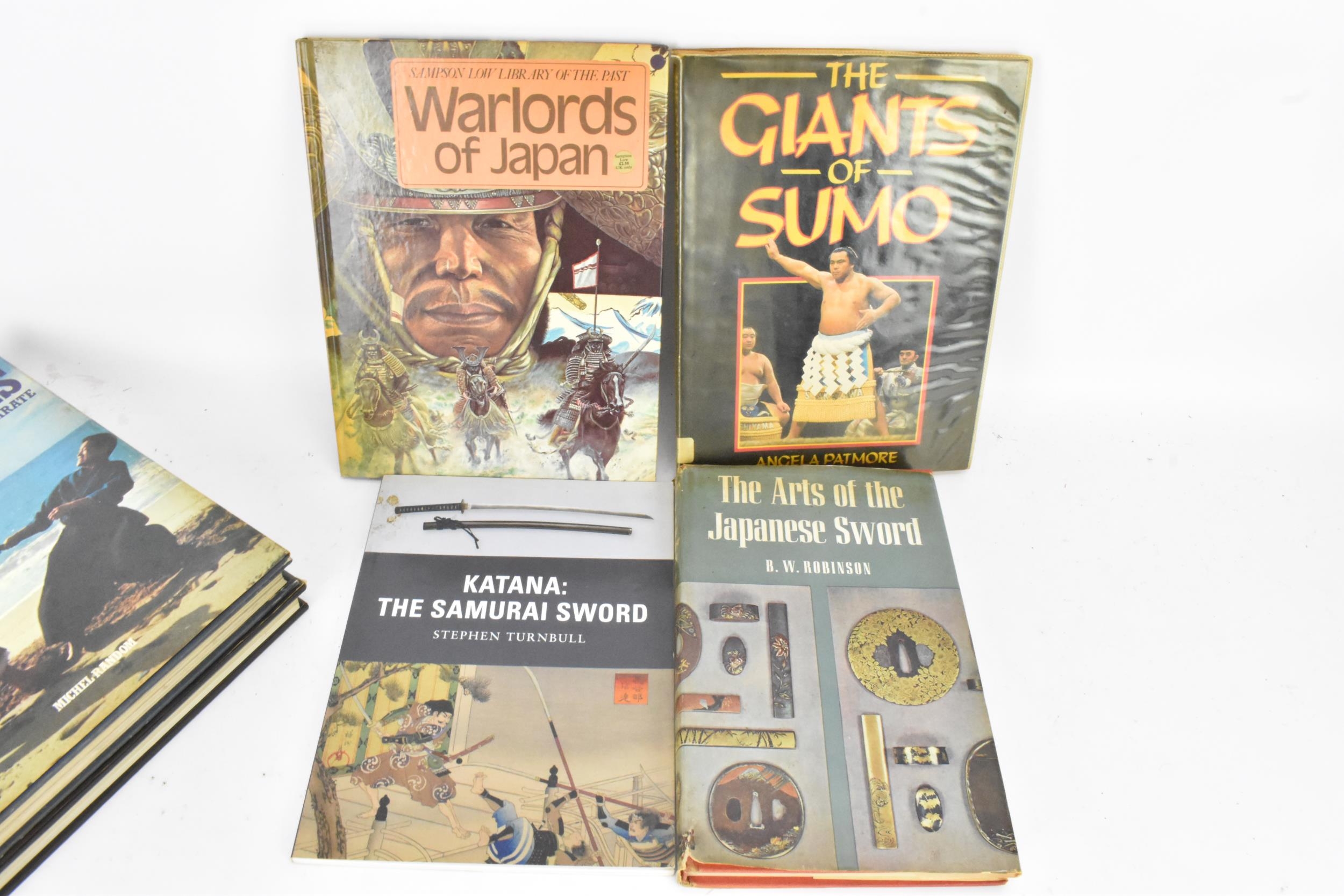 A collection of books to include 'The Fighting Man of Japan' by F.J Norman, 'The Arms & Armour - Image 3 of 4