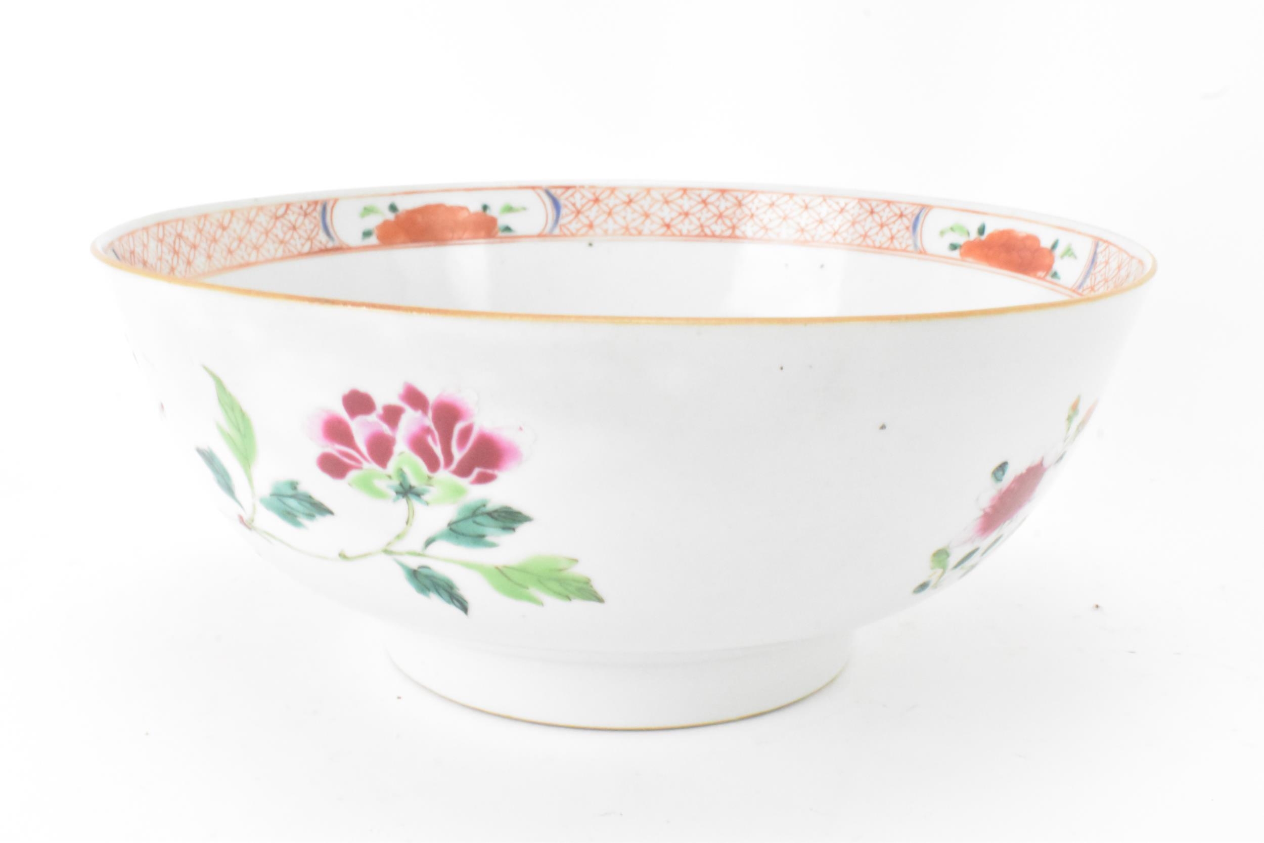 A Chinese famille rose punch bowl, Qianlong, mid 18th century, painted with foliage and the border - Image 3 of 6