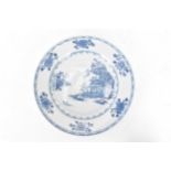 A Chinese 18th century, Qianlong, Nanking cargo blue and white plate, in boatman and six flowers