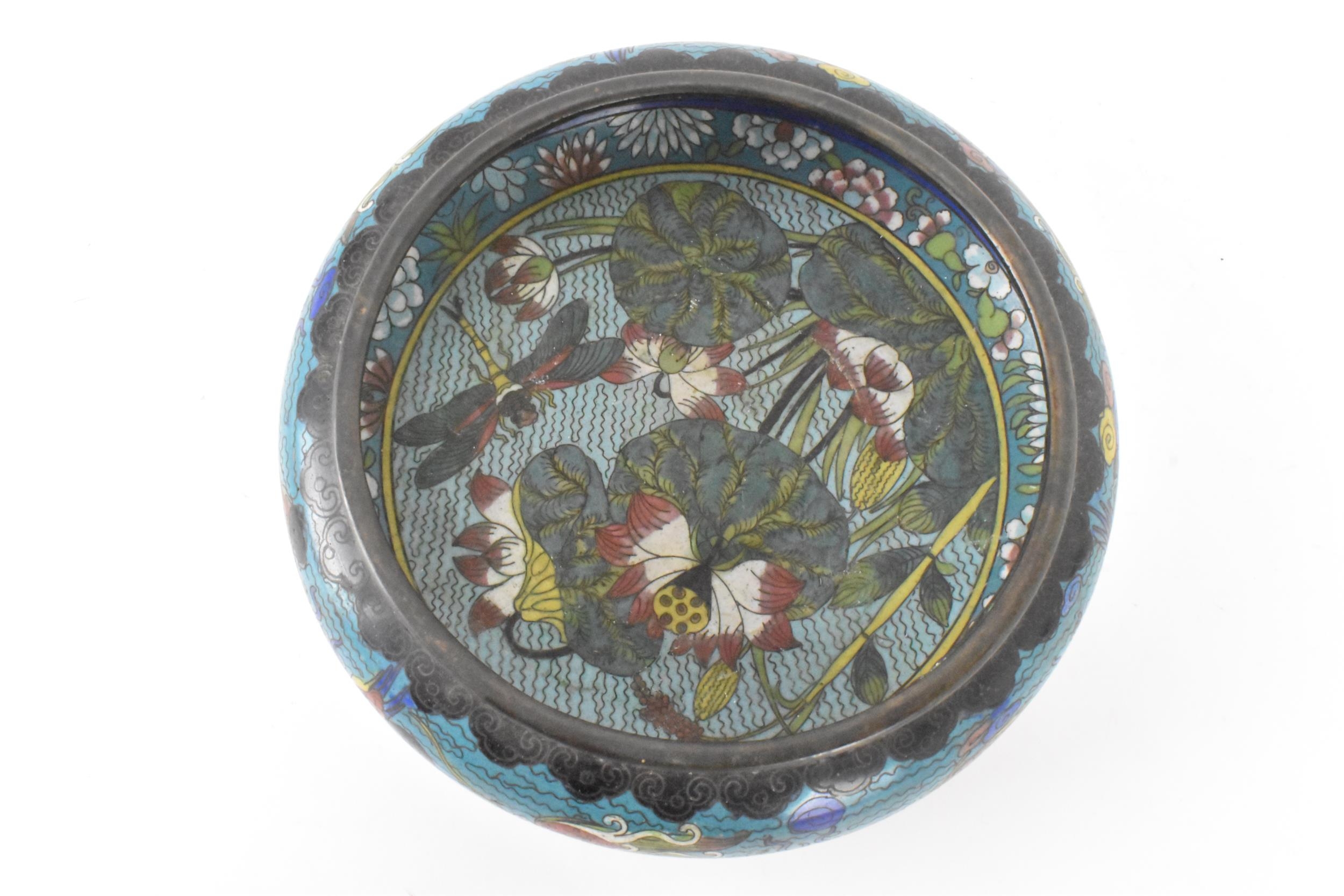 A Chinese cloisonne bowl, late 19th/early 20th century, of shallow form, decorated on a blue - Image 5 of 6