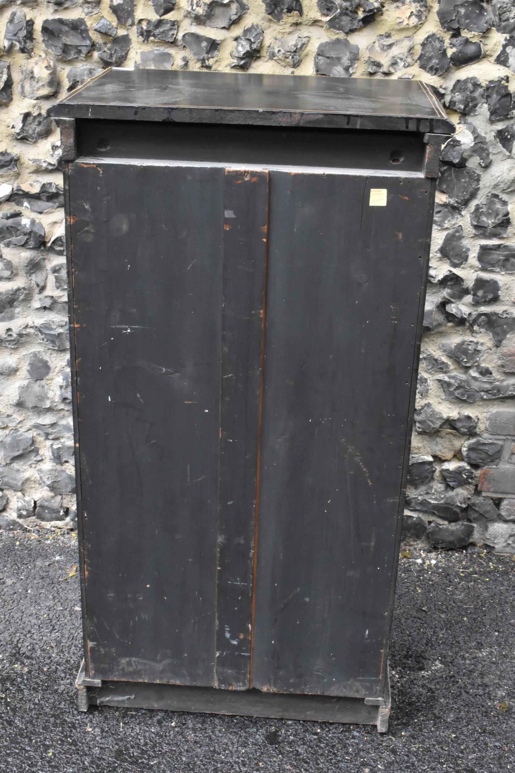 A late Victorian ebonised wellington chest of seven graduating drawers, applied gilt beading and - Image 6 of 6