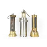 A military issue CEAG miners lamp, engraved with a broad arrow mark, 29cm high excluding handle,