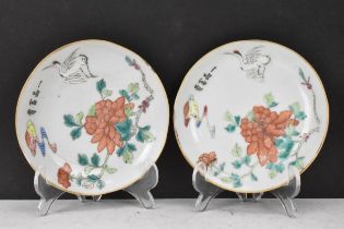 A pair of Chinese late Qing dynasty, Tongzhi porcelain famille rose dishes, each decorated with a