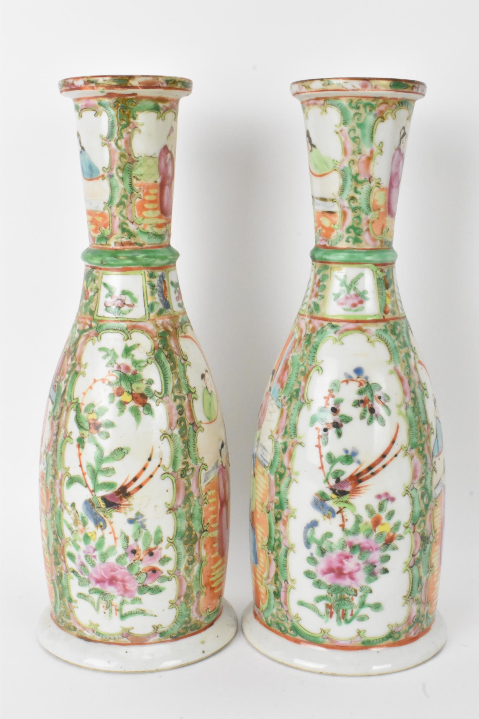 A pair of Chinese late 19th century Canton Famille Rose vases, of cylindrical tapered form, the - Image 2 of 8