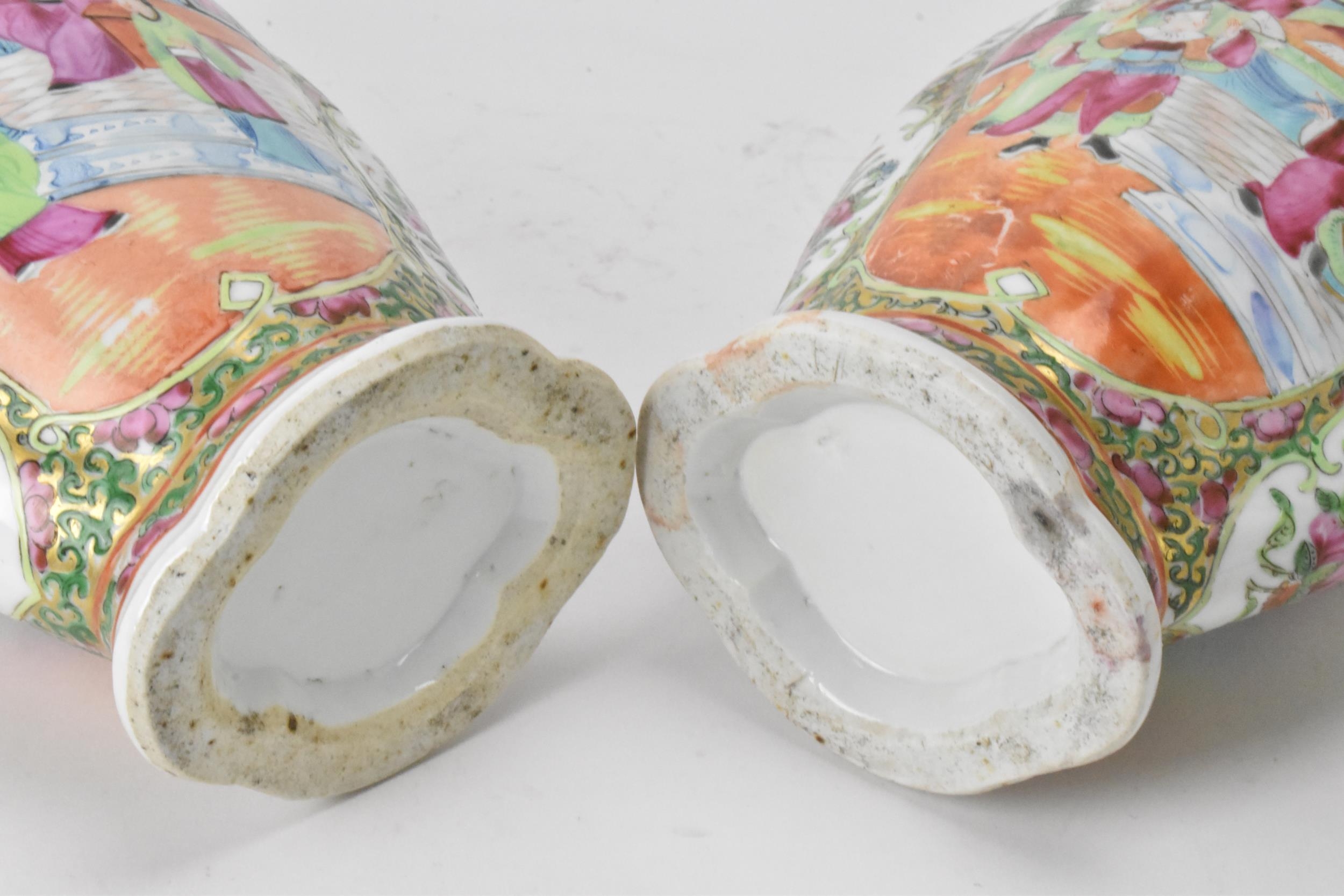 A pair of Chinese export Canton Famille Rose vases, Qing Dynasty, late 19th century, in polychrome - Image 6 of 6