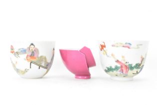 Three Chinese 20th century famille rose tea bowls to include one decorated with figures seated round