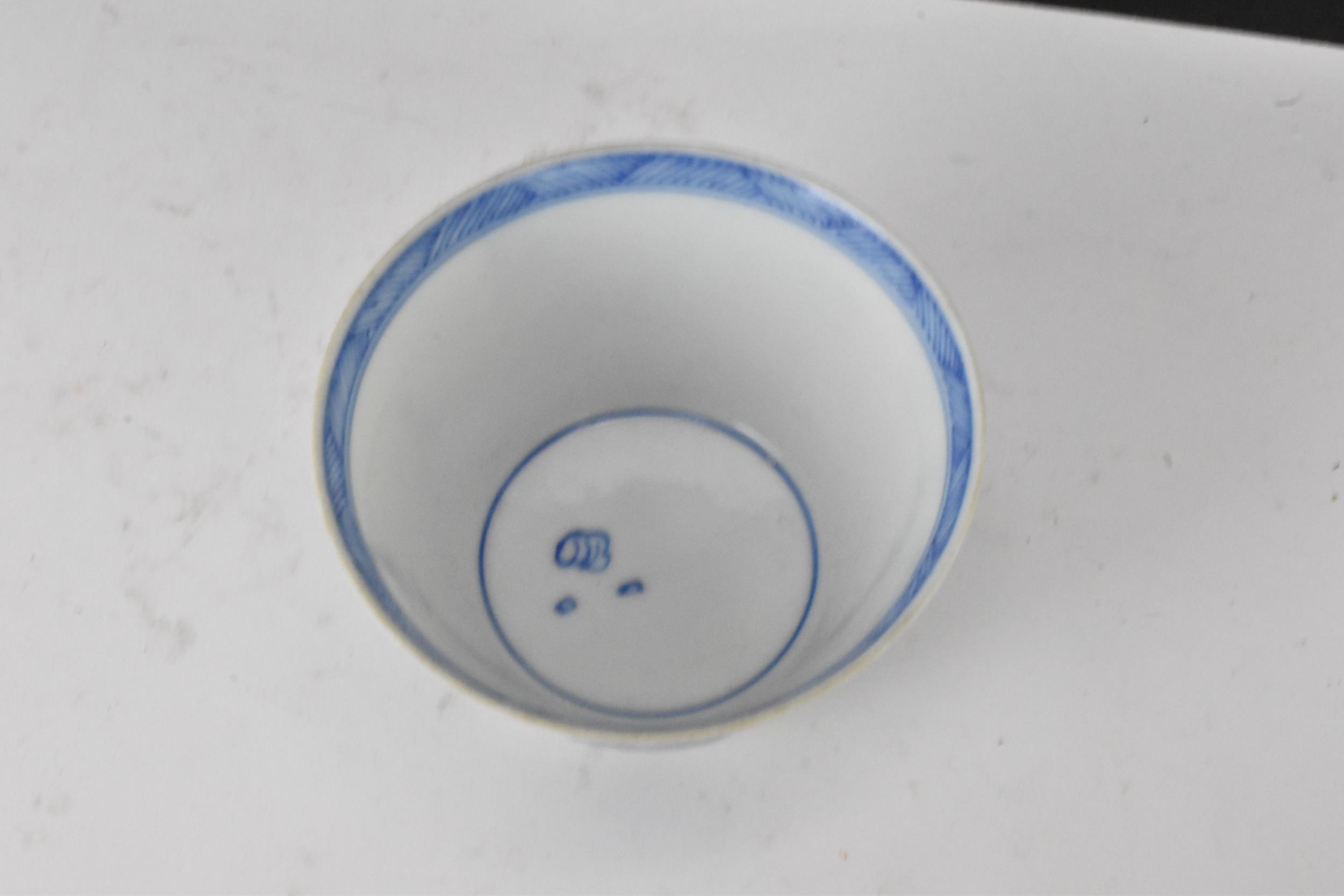 Three Chinese 20th century blue and white bowls, decorated with dragons and interiors with central - Image 8 of 9