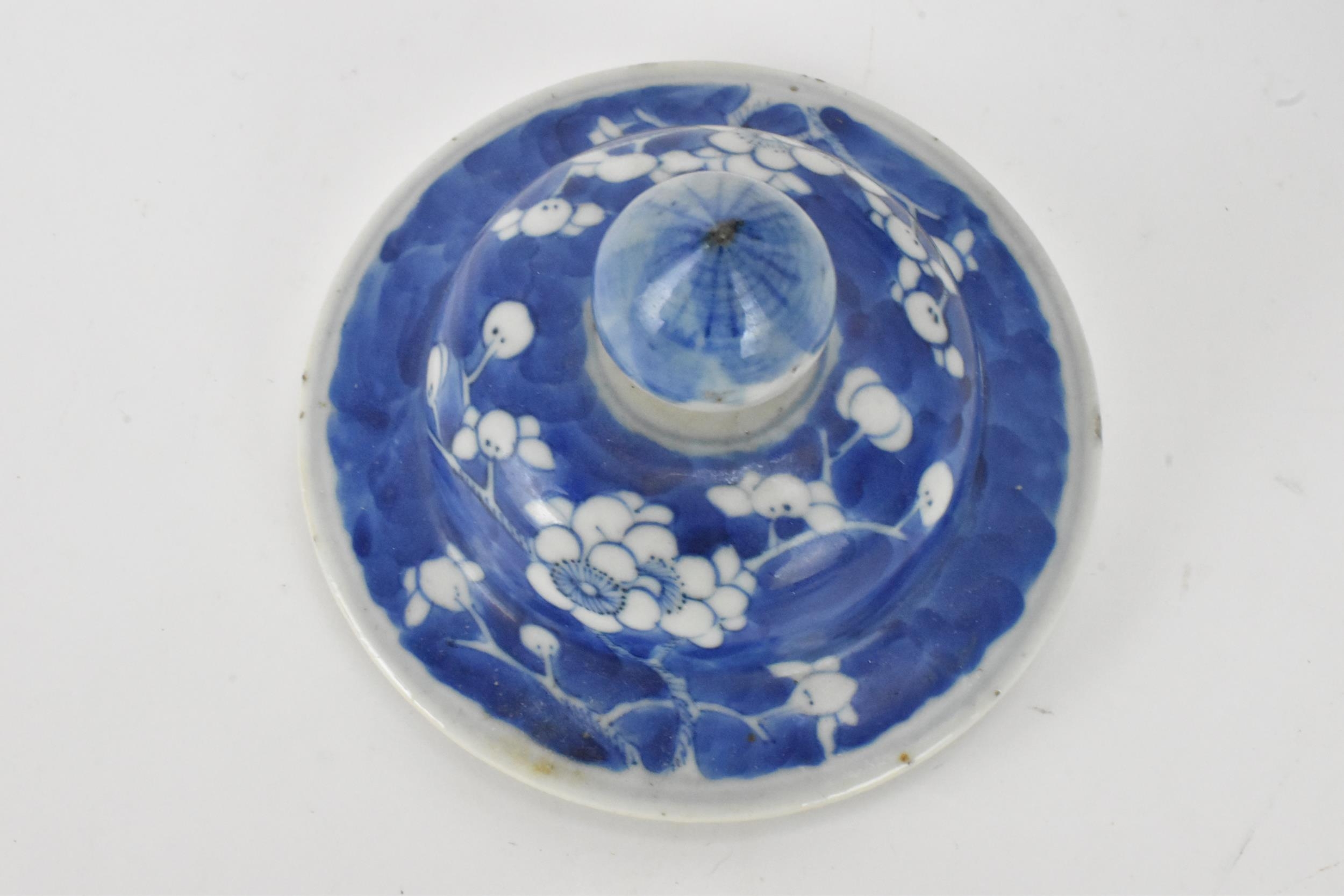 A Chinese prunus pattern blue and white vase, late Qing Dynasty, of baluster form with domed cover - Image 5 of 8