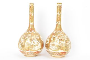 A pair of Japanese Meiji period satsuma bottle neck vases, of onion shape with shaped cartouches