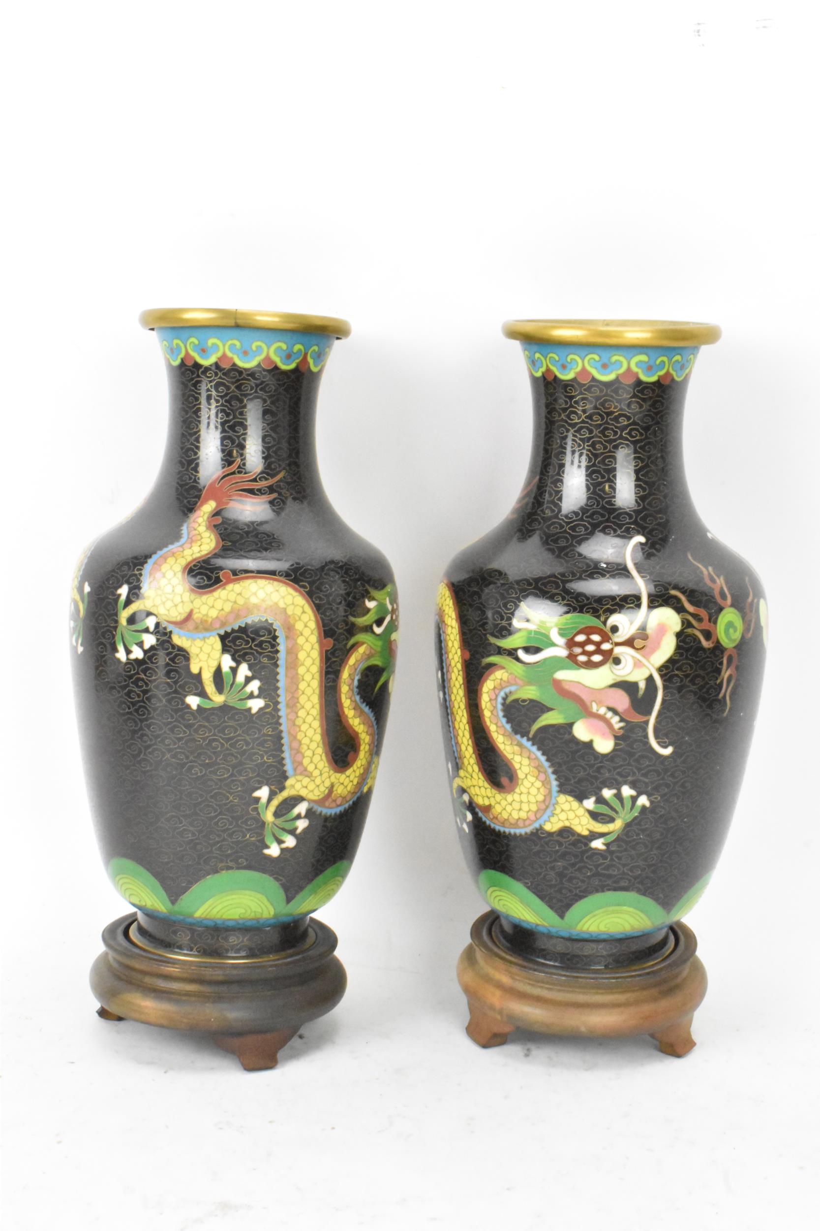 A pair of Chinese mid 20th century cloisonne vases, with black grounds decorated with confronting - Image 4 of 6