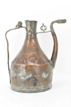 A late 19th/early 20th century Islamic handmade copper water jug, the top having incised repeated