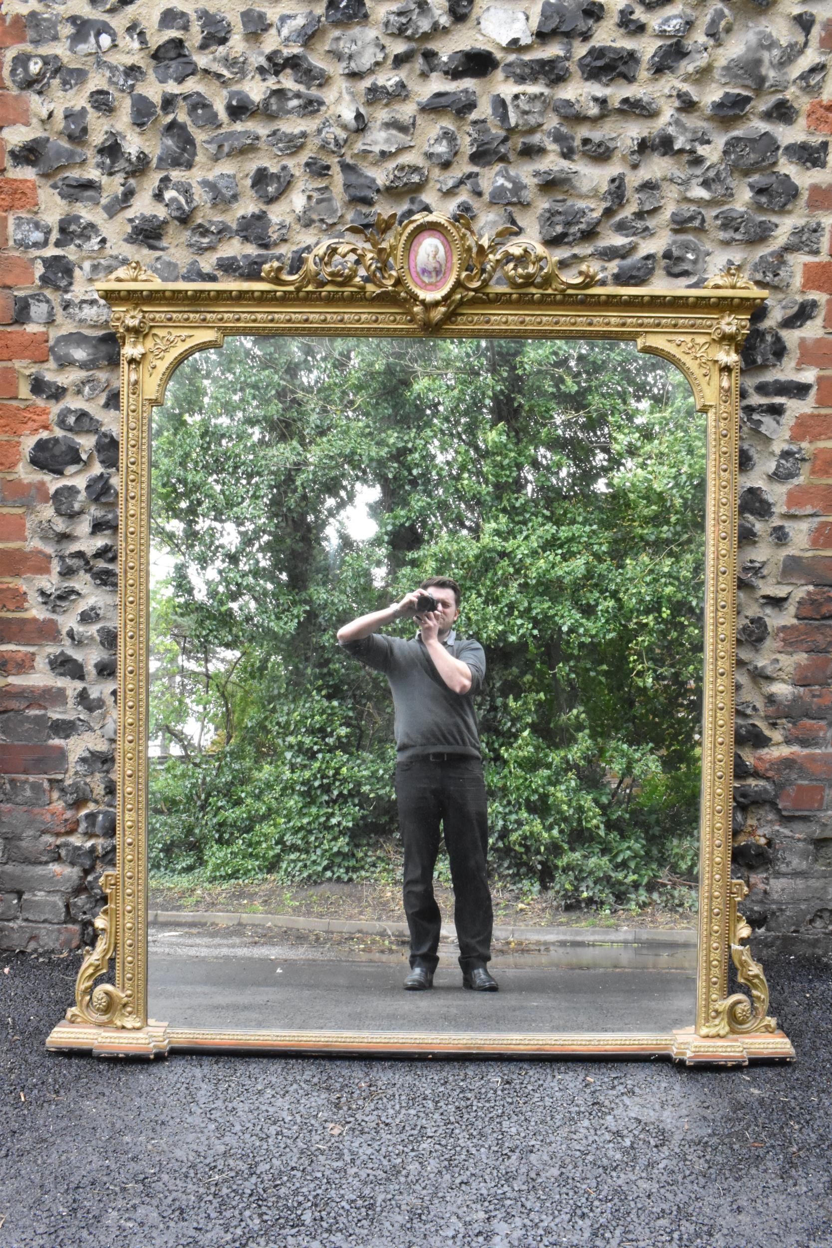 A 19th century French Louis XVI style large gilt wall mirror, having a sevres style painted plaque - Image 2 of 13