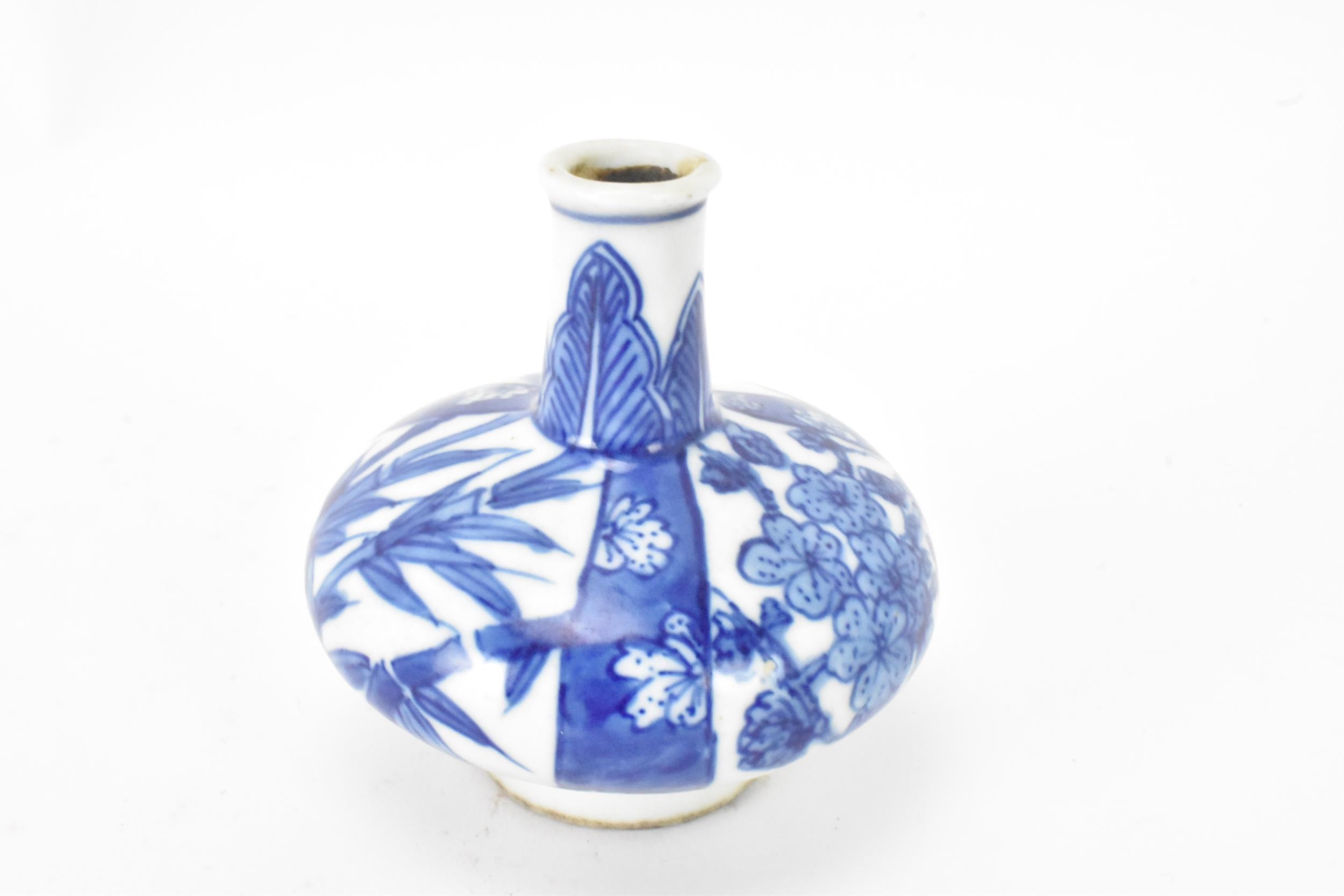 A Chinese miniature vase, Kangxi period (1660-1722) of squat baluster shape decorated in blue and - Image 4 of 5