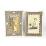Two similar Persian late Qajar dynasty photograph frames, the profusely inlaid frames having multi
