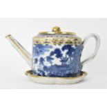 A Chinese export Qing dynasty blue and white teapot and stand, late 18th century, decorated with