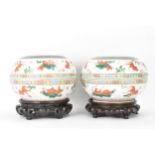 Two Chinese famille rose circular formed lidded boxes, early 20th century, decorated in polychrome