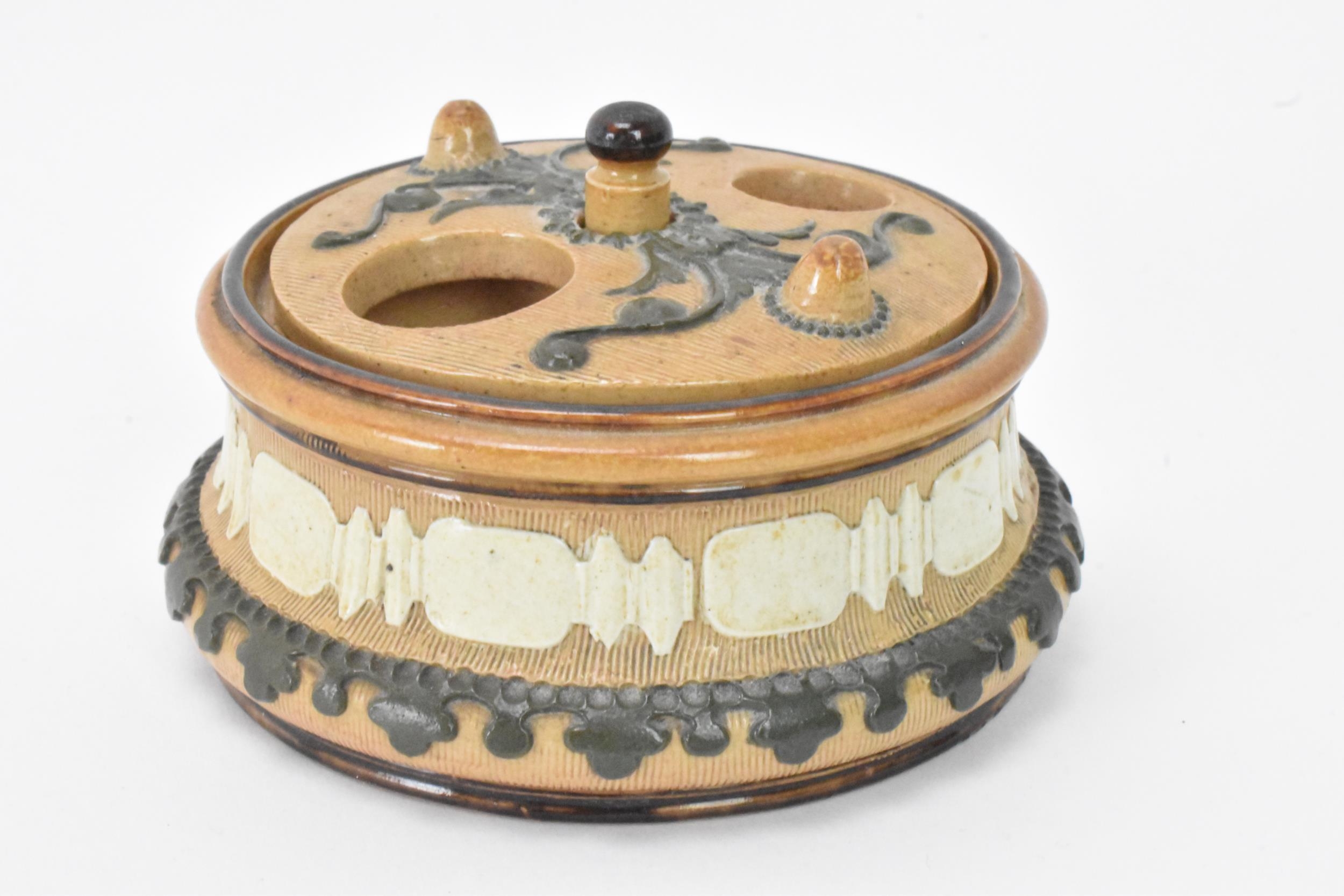 A rare and unusual Doulton stoneware container, possibly an inkwell with revolving lid, the well - Image 2 of 10
