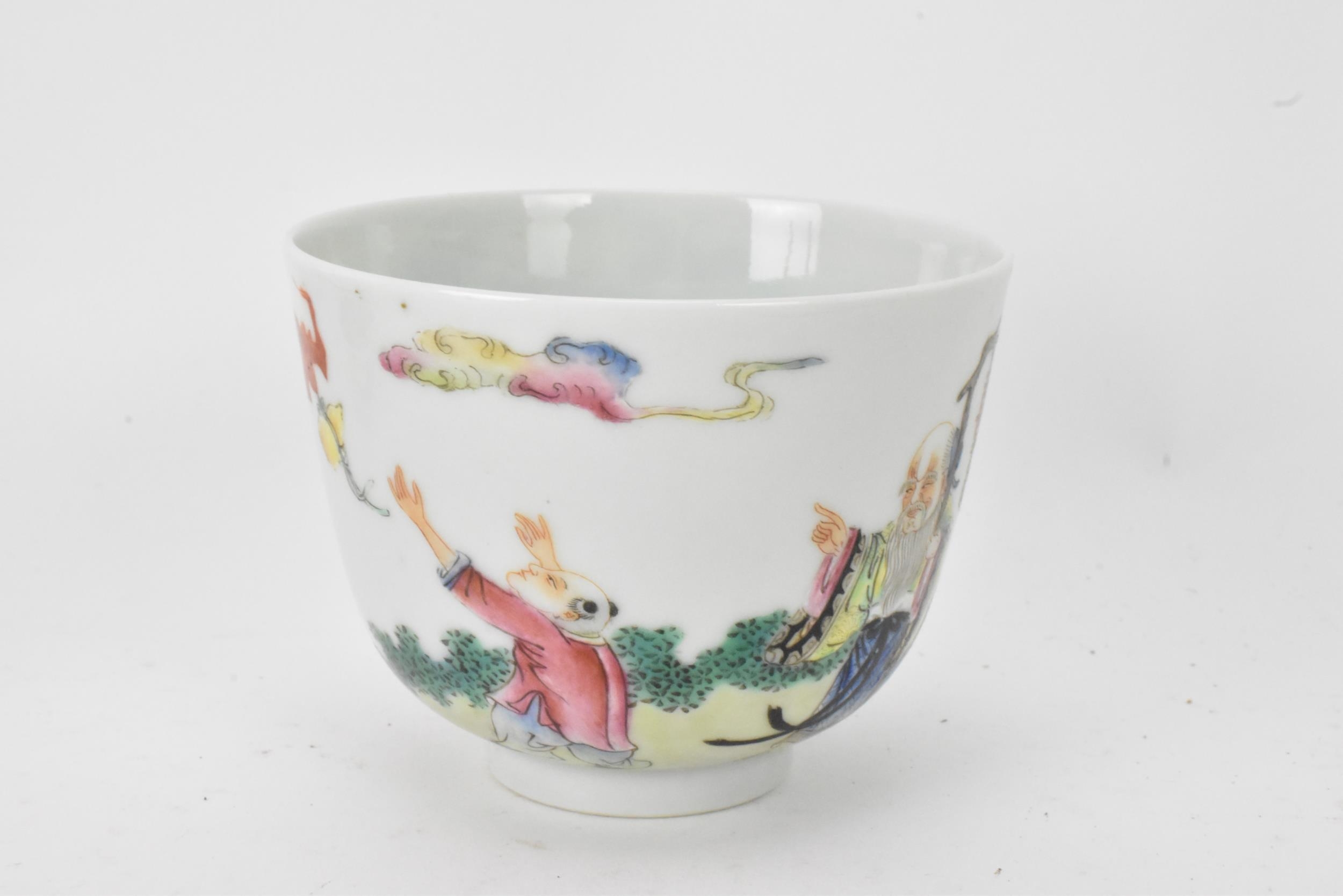 Three Chinese 20th century famille rose tea bowls to include one decorated with figures seated round - Image 2 of 9
