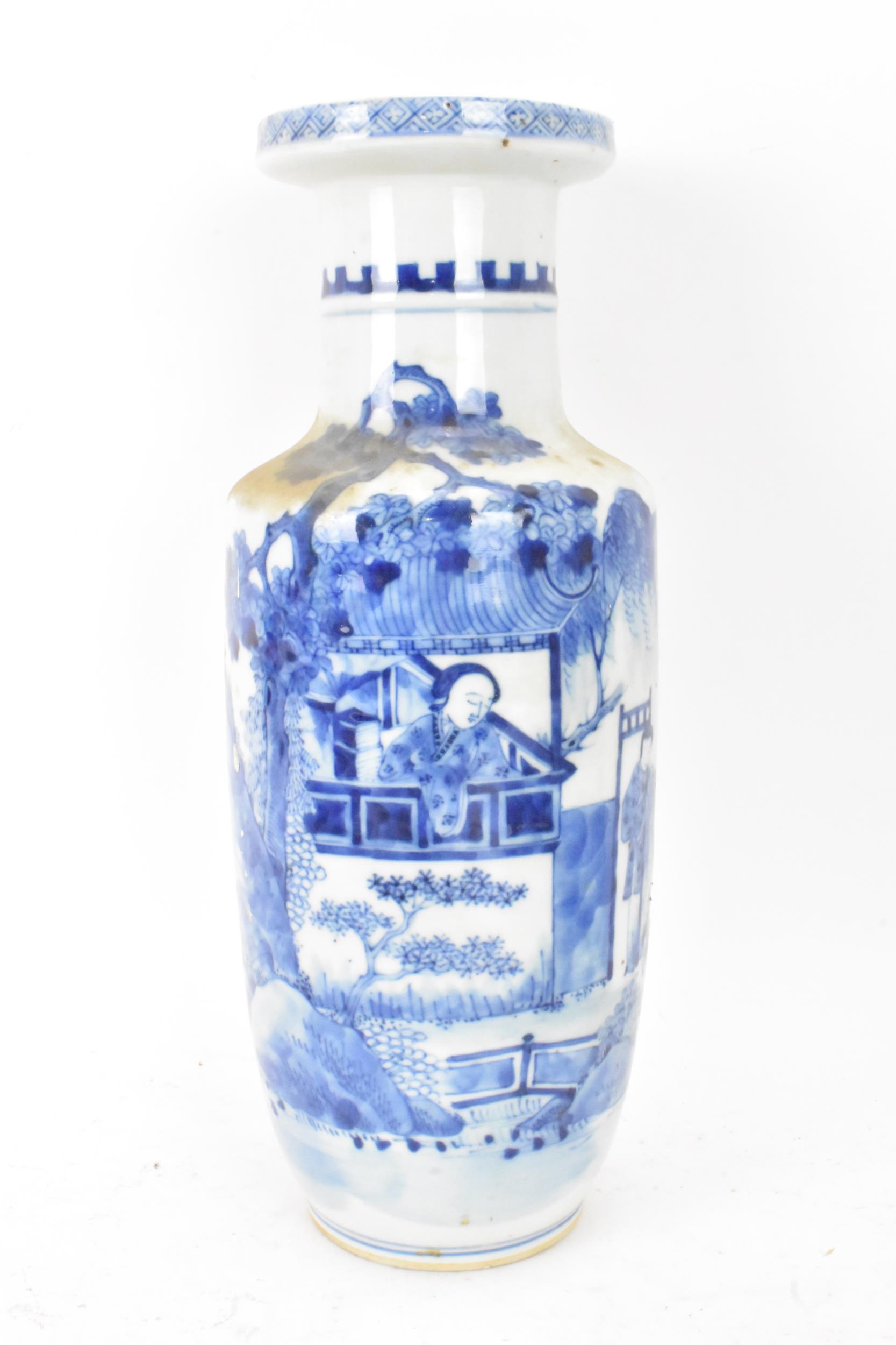 A Chinese late Qing dynasty blue and white rouleau vase, late 19th/early 20th century, decorated