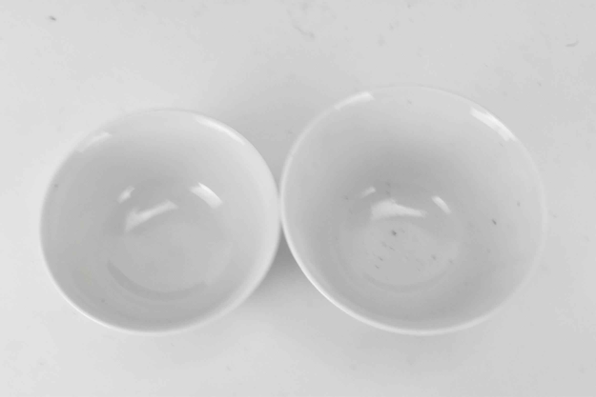 Two Chinese 20th century blue and white tea bowls, one decorated with calligraphy and the other of a - Image 4 of 5