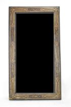 A 19th century Persian Qajar katamkari wall hanging mirror, the cushion moulded frame profusely