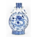 A Chinese blue and white moon flask, late Qing Dynasty, the central panels either side depicting