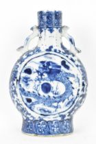 A Chinese blue and white moon flask, late Qing Dynasty, the central panels either side depicting
