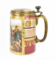 A brass-mounted Royal Vienna porcelain tankard, of cylindrical form painted with a figurative