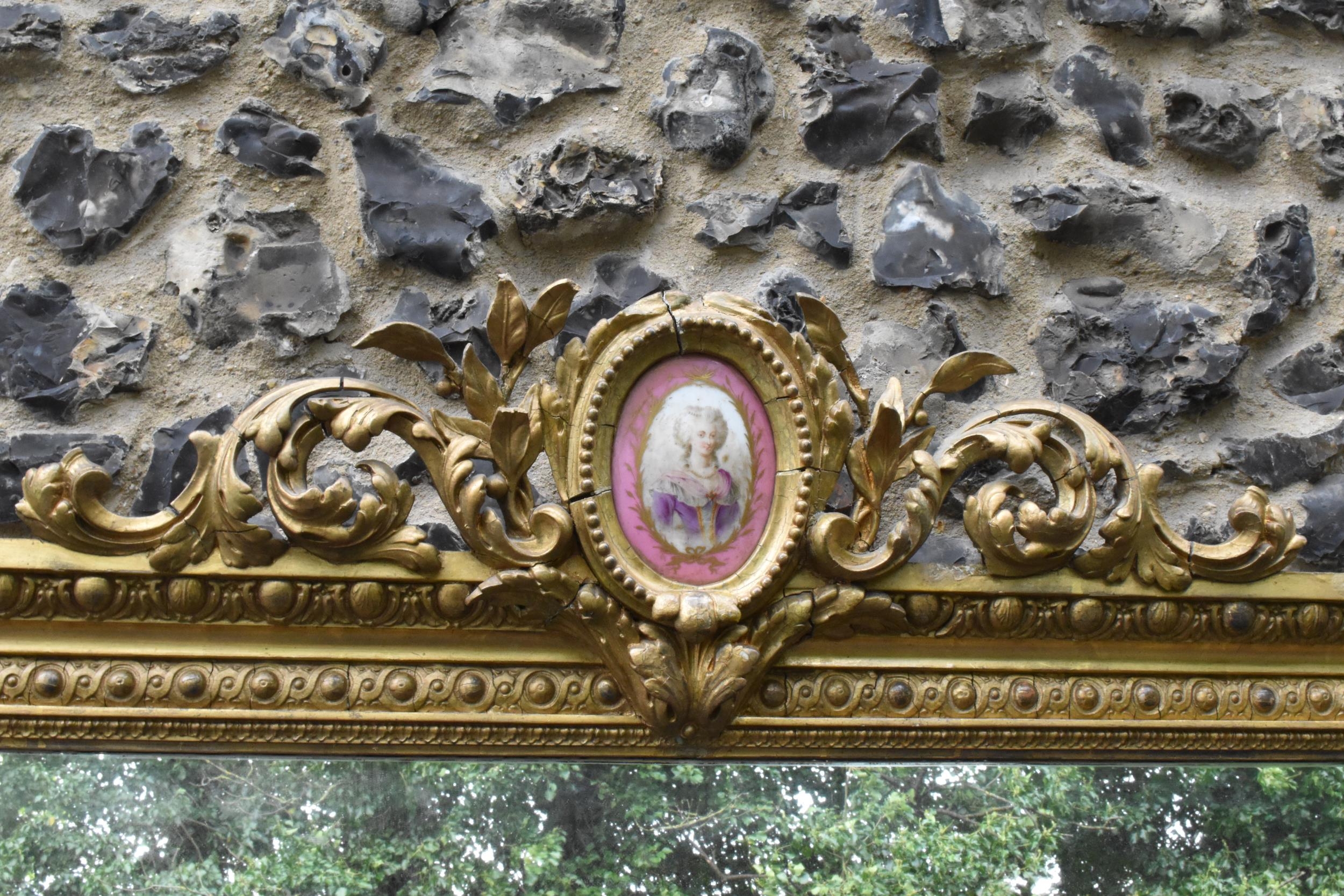 A 19th century French Louis XVI style large gilt wall mirror, having a sevres style painted plaque - Image 11 of 13