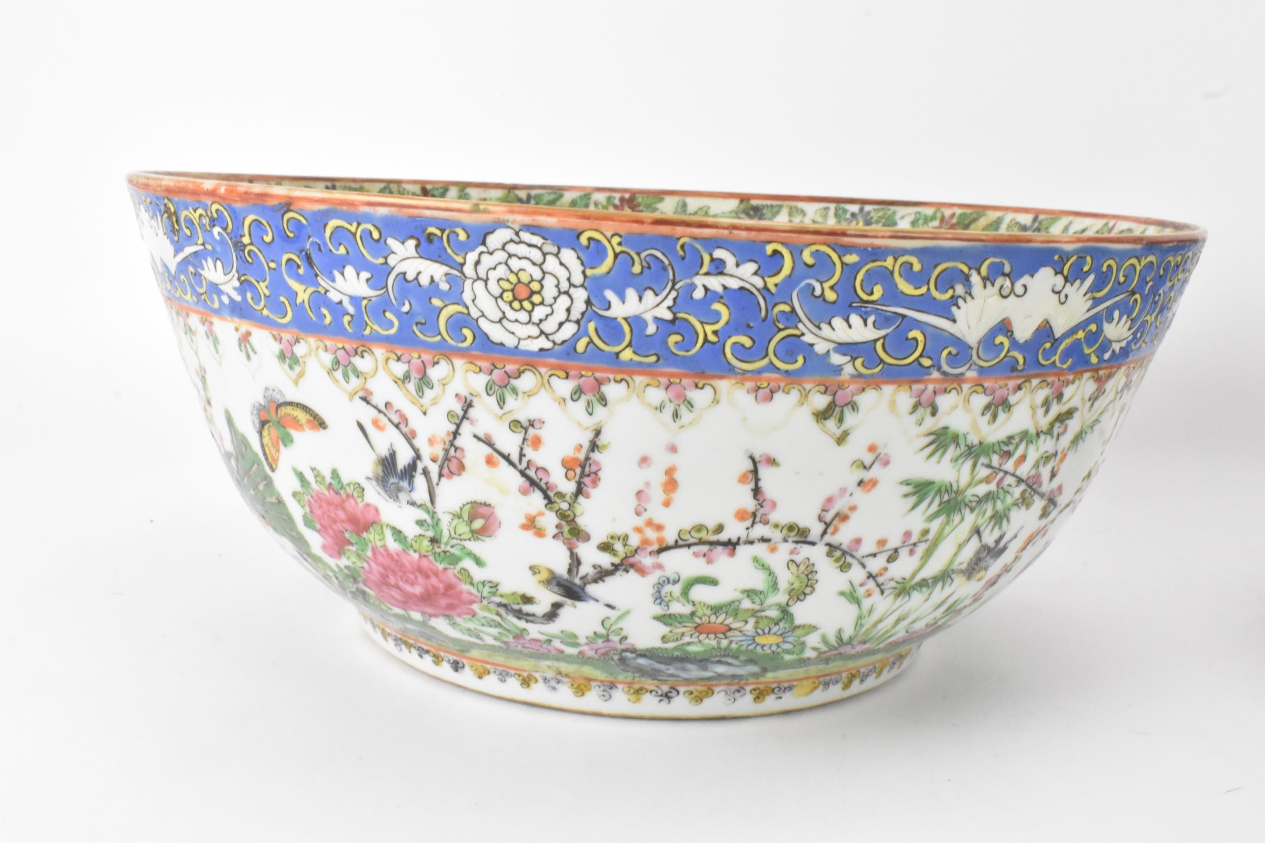 A near pair of Chinese export Canton famille rose punch bowls, Qing dynasty, late 19th century, - Image 5 of 15
