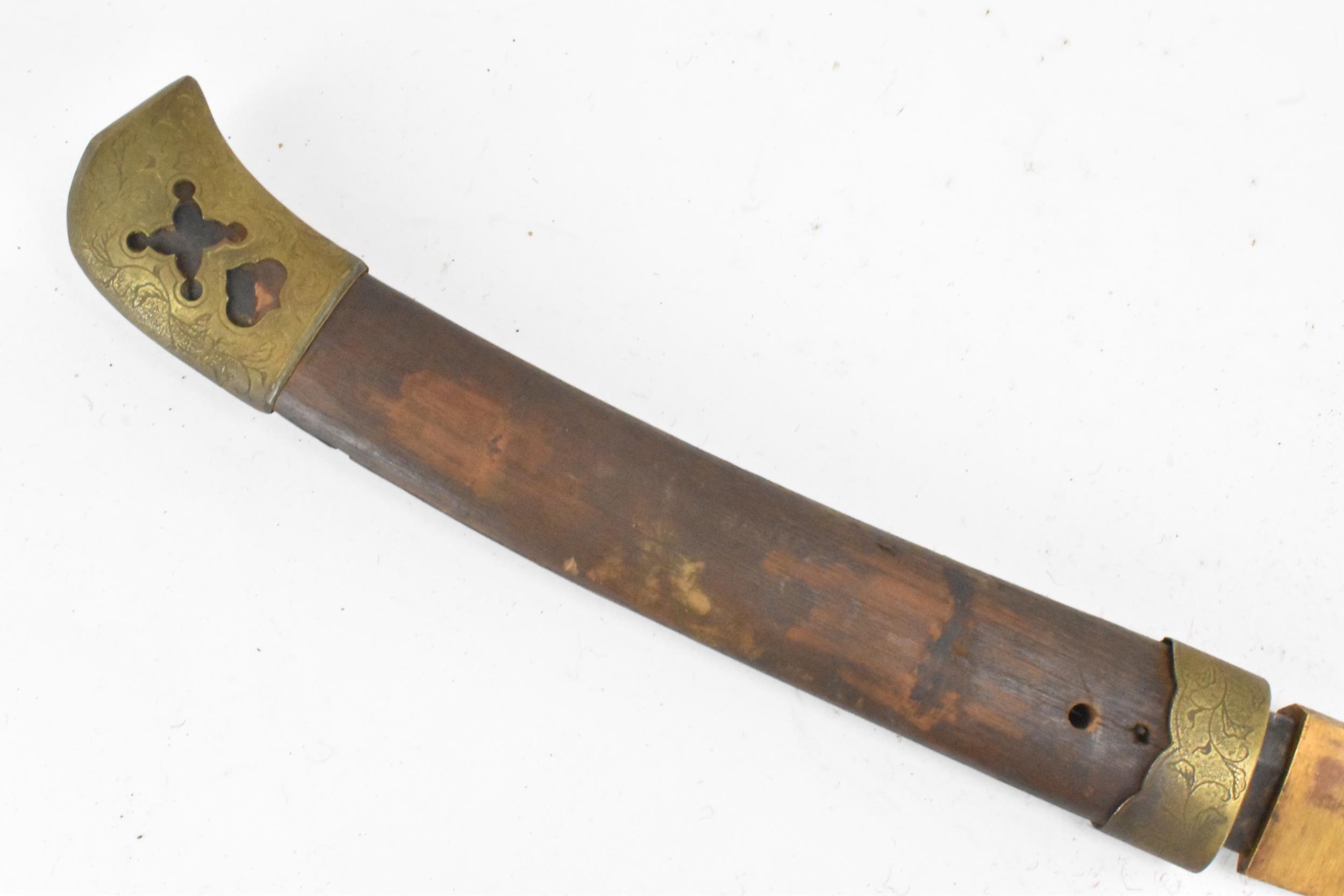 A Japanese Katana sword, steel blade, brass pierced tip with treen handle, the curved blade - Image 3 of 7