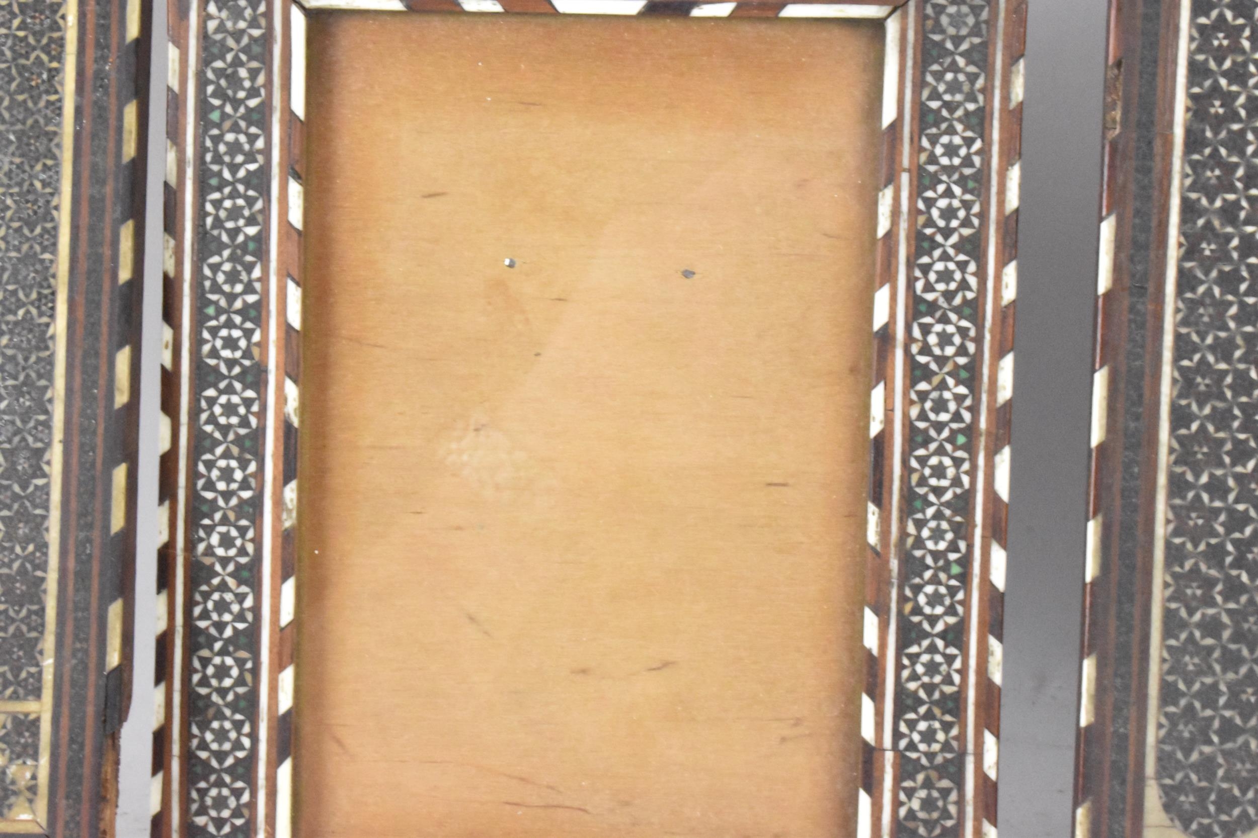 Three similar Persian late Qajar dynasty photograph frames, the profusely inlaid frames having - Image 8 of 14