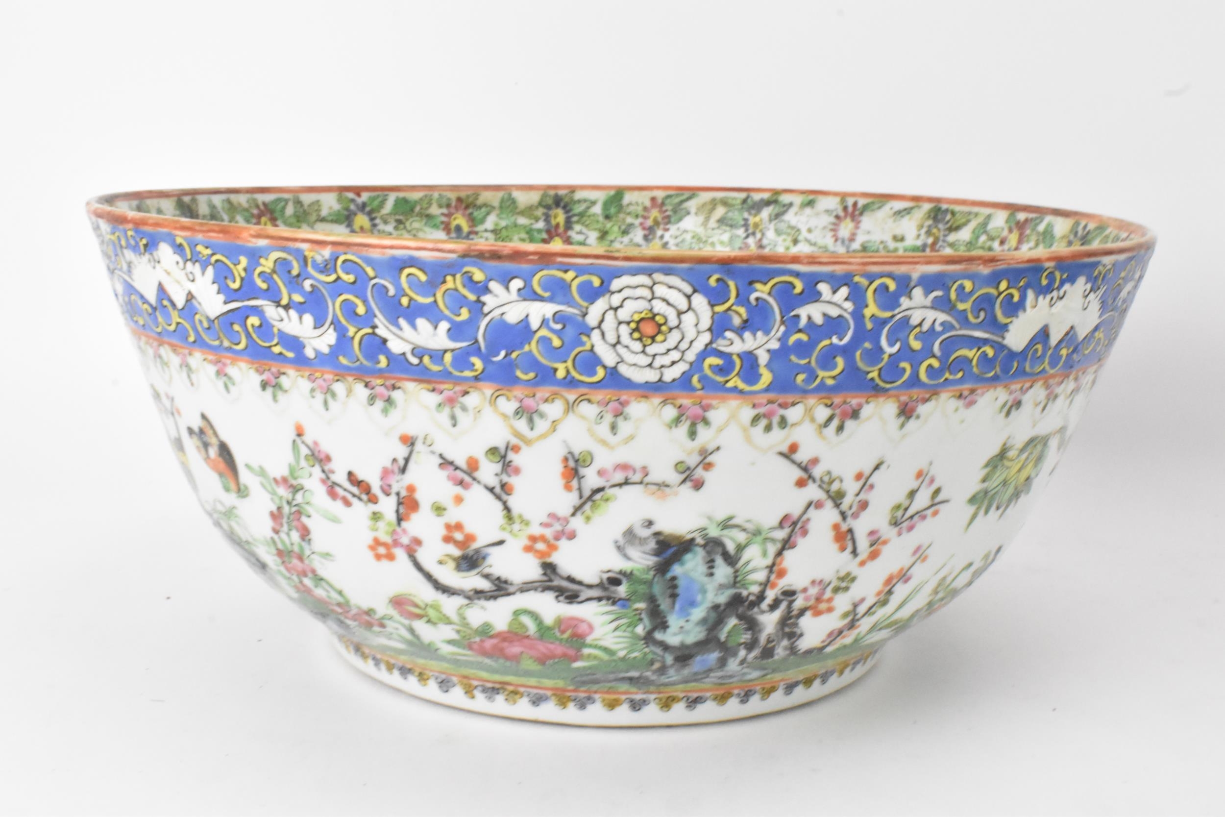 A near pair of Chinese export Canton famille rose punch bowls, Qing dynasty, late 19th century, - Image 3 of 15