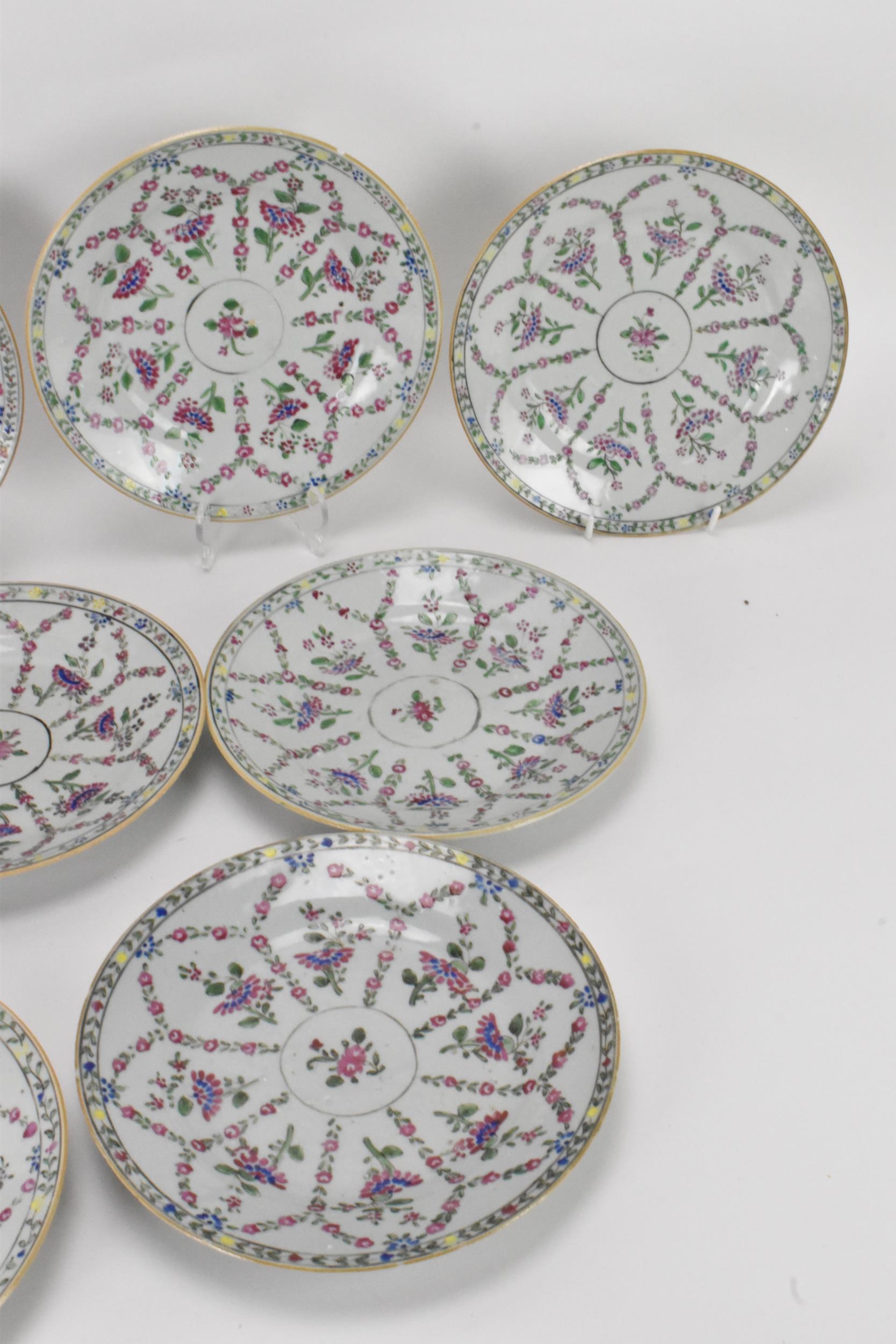 A set of twelve Chinese Qing dynasty famille rose plates, 18th century, having central flower - Image 2 of 5