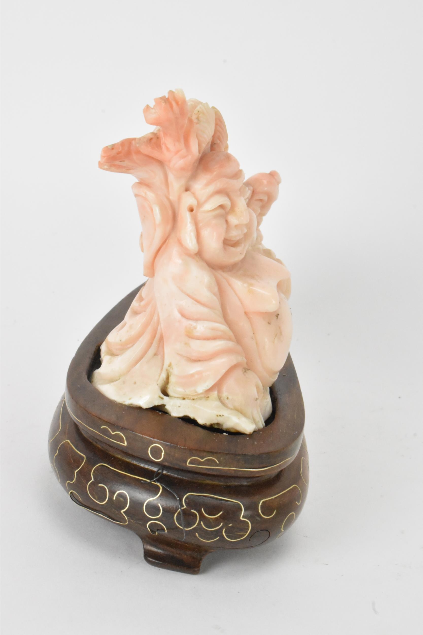 A Chinese 20th century coral carving depicting a laughing Buddha with child among a nautical - Image 4 of 6