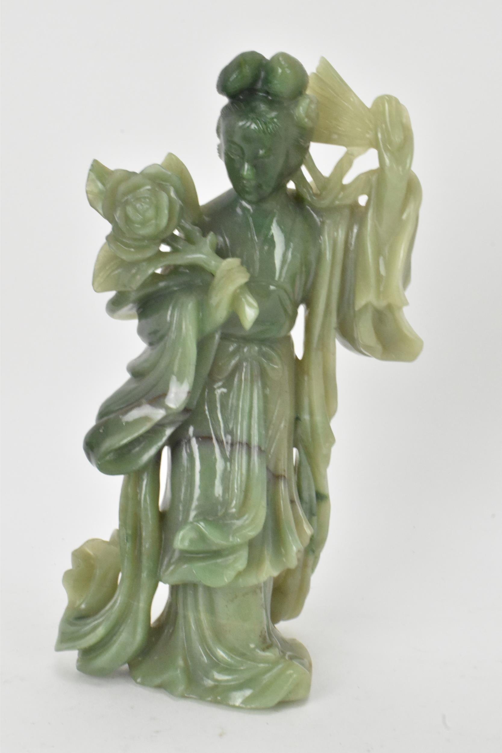 Two Chinese 20th century jadeite carved figures, the green example modeled holding a fan and flowers - Image 5 of 7